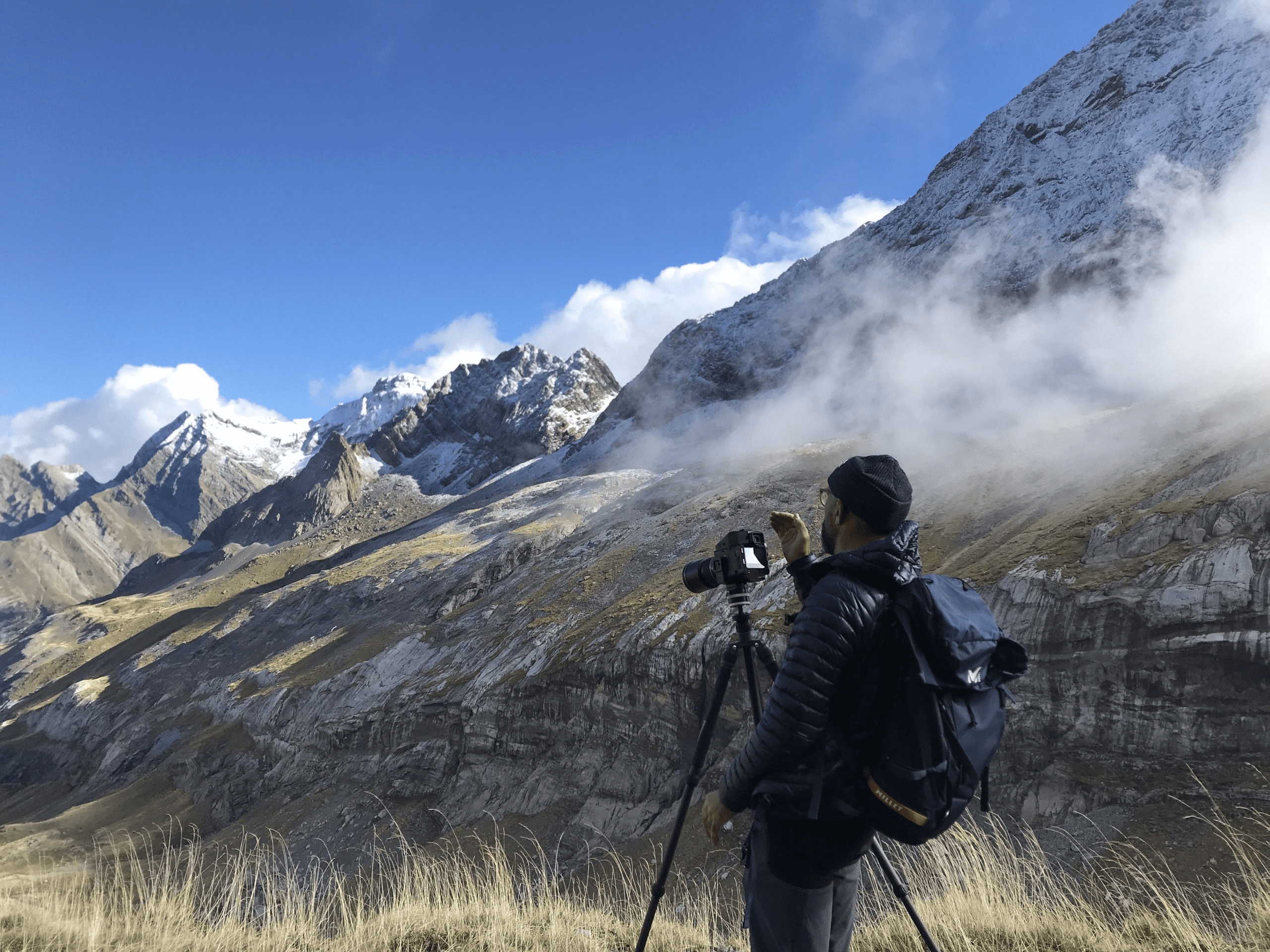 Un photographe attend la neige…